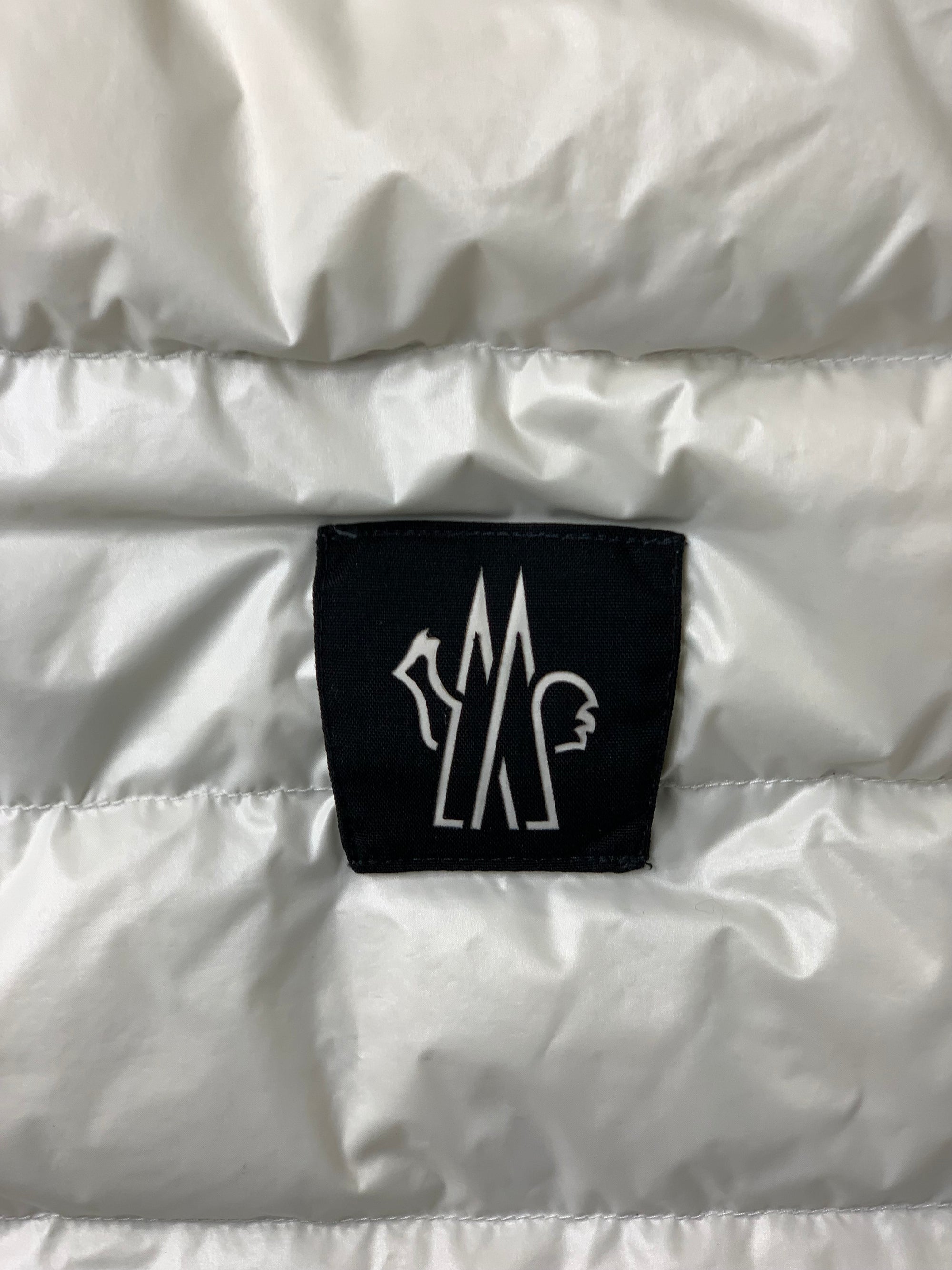Veste de ski Moncler blanche et noire 10 ans